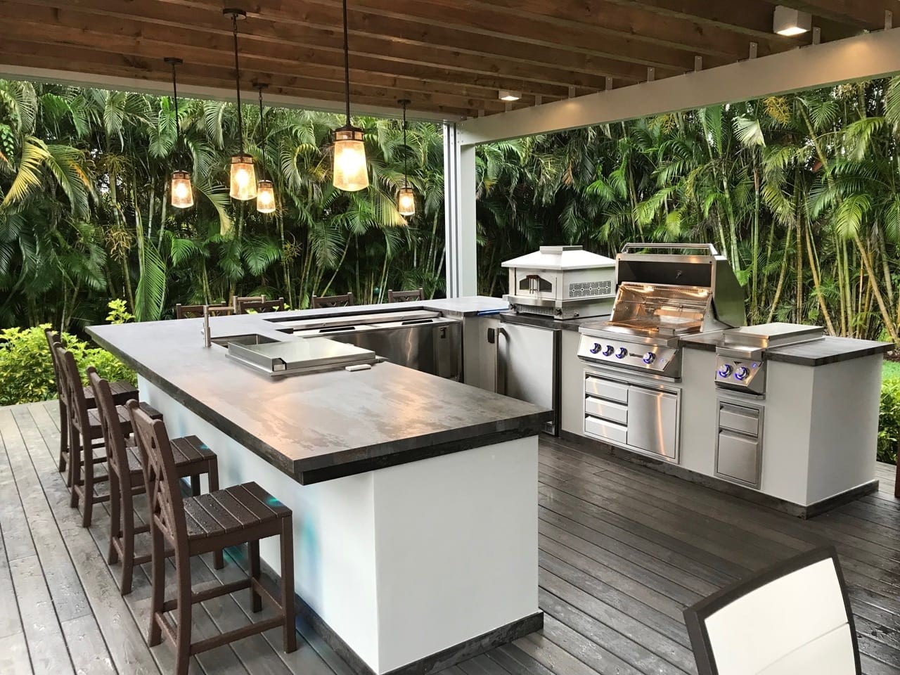 a patio with a fully functional kitchen