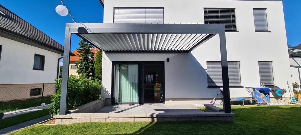 attached grey pergola in austria